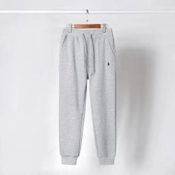 Grey pants with black label